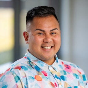 Headshot of Brennen Palisbo.