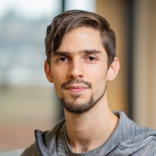 Headshot of Alvaro Herrasti.