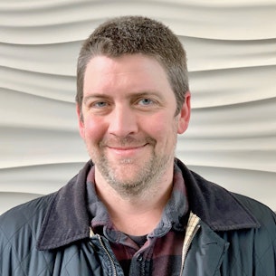 Headshot of Rob Evans.