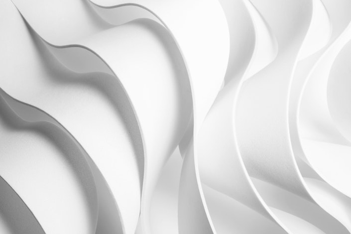 An abstract illustration of swirling shapes, meant to denote a futuristic feeling.