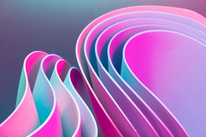 An abstract illustration of swirling shapes, meant to provoke a futuristic feeling.