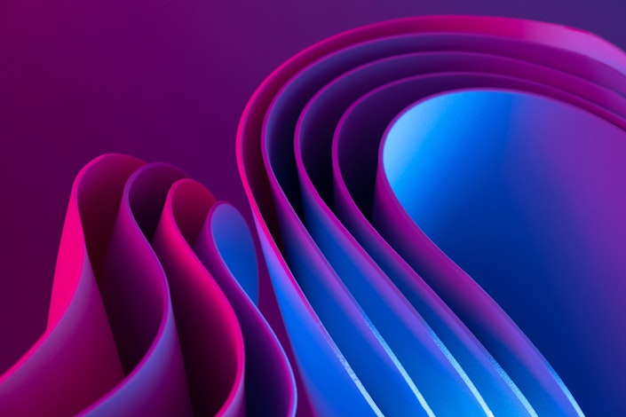 An abstract illustration of rippling shapes, meant to provoke a futuristic feeling.