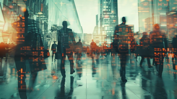 Network and internet communication concept. Silhouettes of business people in abstract city with double exposure of blurry network interface