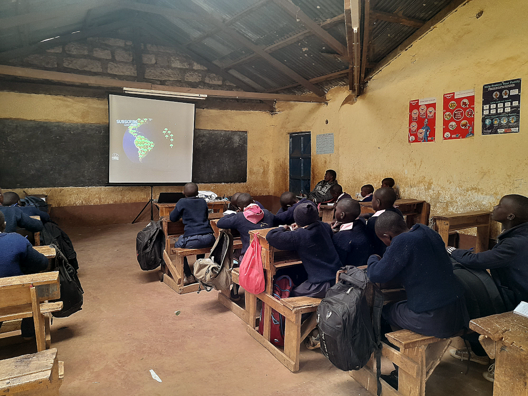 Junior Ranger Program session with engaging digital course content. Photo courtesy Daisy Awiro.