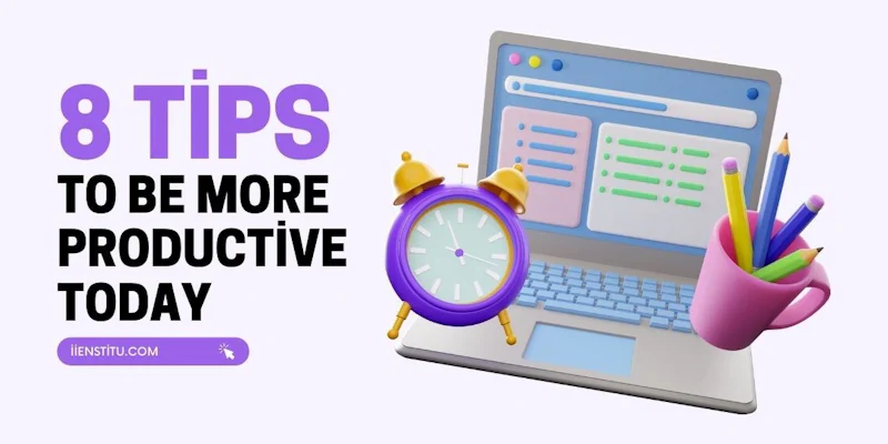 A close-up of a laptop sitting on a table is shown. On the laptop is a purple and yellow alarm clock with the hands pointed at the ten o'clock position. To the left of the laptop is a pink mug holding several pencils. On the table in front of the laptop are more pencils and a few other items. The laptop's screen is blank and unoccupied. The background is a lightly colored wall with some decorative elements. The overall scene is one of a simple, yet organized workspace.