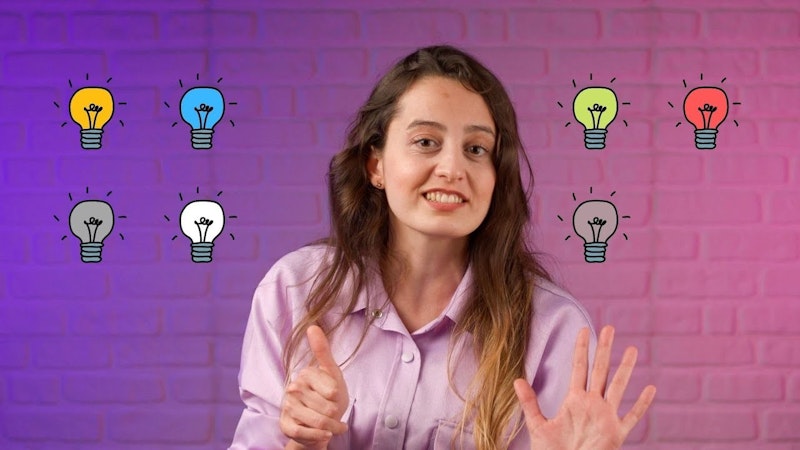 Bir kadın ellerini kaldırmış, yüzünün etrafında ampul desenleri olan açık mavi bir gömlek giymiş halde duruyor. Saçları kısa ve sarıdır ve arkasındaki duvarlar bir ampul çizimi ve pembe ve mor bir arka planla süslenmiştir. Ön planda, sarı bir ampul ve pembe bir arka plan ile elinin yakın çekimi var. Sağda gömleğinin yakın çekimi ve ortada üzerinde bir insan eli çizilmiş bir ampul var. Ampuller yumuşak sarı bir parıltı yayarak çarpıcı ve benzersiz bir atmosfer yaratıyor.