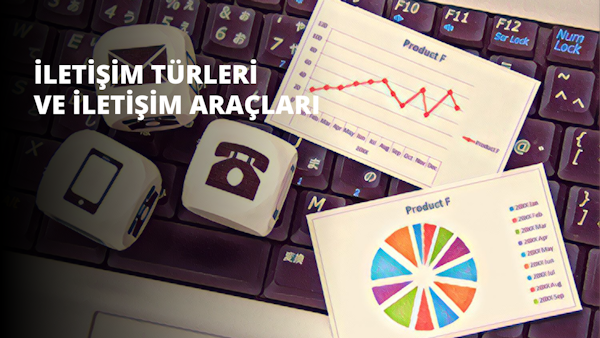 Üzerinde zar ve kağıt olan bir klavyenin yakın çekimi. Klavye gri ve parlak bir yüzeye sahip. Kağıdın üzerinde siyah mürekkeple çizilmiş bir çizgi ve üzerinde bir nokta bulunan kırmızı bir nokta grafiği vardır. Arka planda, merkezi beyaz olan renkli bir daire vardır. Klavyenin sol tarafında beyaz renkte bir telefon logosu bulunmaktadır.