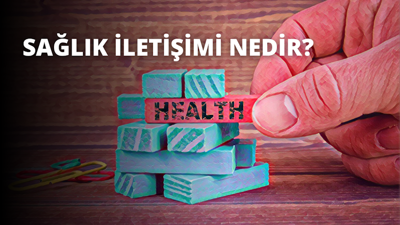 Açık renkli bir tahta parçasını kavrayan bir elin yakın çekimi. El, başparmak ve işaret parmağı kavrama pozisyonunda olacak şekilde konumlandırılmış ve diğer üç parmak içe doğru kıvrılmış. Ahşap pürüzsüz ve yeni kesilmiş gibi görünüyor. Ahşabın kenarları hafifçe yuvarlatılmış. Arka plan odak dışıdır ve mavi ve yeşil tuğlaların bir kombinasyonu gibi görünmektedir. Sol alt köşede siyah harflerle pembe bir işaret var. Sağ üst köşede, bir grup nesnenin bulanık bir görüntüsü var. Ortada, mavi ve beyaz çizgili bir nesnenin yakın çekimi, mavi bir kutunun yakın çekimi ve mavi bir küpün yakın çekimi var. Görüntüdeki tüm renkler soluk ve açık renkli ahşapla kontrast oluşturuyor.