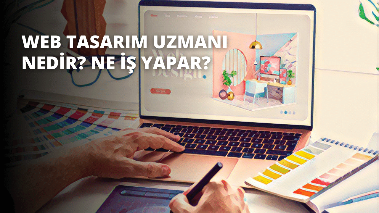 Resimde dizüstü bilgisayar kullanan bir kişi görülüyor. Dizüstü bilgisayar siyah bir masa üzerinde açık ve kişi dizüstü bilgisayarın ekranına bakıyor. Elleri dizüstü bilgisayarın klavyesinin üzerine yerleştirilmiş. Arka planda, kalem tutan bir elin bulanık bir yakın çekimi ve bir klavyenin yakın çekimi görülüyor. Kişinin sağında bir bilgisayar ekranı ve bir telefon görülüyor. Kişi beyaz bir gömlek ve mavi bir kot pantolon giymektedir. Görüntü geniş bir açıyla çerçevelenmiş ve renkler canlı ve parlak.
