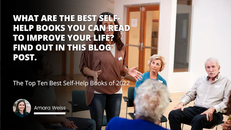 A woman stands confidently in the center of a group of people, her hands outstretched and her expression determined. She wears a white blouse, black pants, and black shoes. Behind her, a man sits in a chair, his face partially obscured in the background. To the right of her, a person's head is visible and appears to be blurred. On the bottom left, a phone screen is visible, and on the top right, a blurry sign is seen. On the woman's blouse, a white letter 'O' can be seen on a brown background.