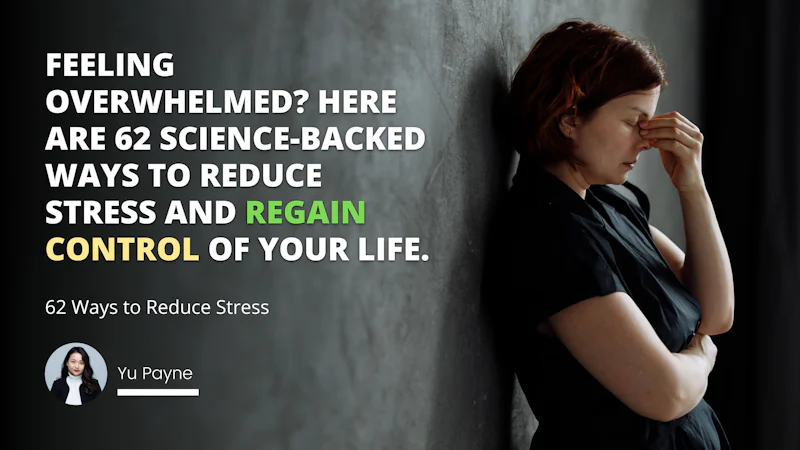 A woman with long, dark hair stands against a white wall. She wears a black jacket and a white turtleneck. Her arms are crossed and left hand is up to her face. She looks off into the distance with a thoughtful expression. In the background there is a screenshot of a social media post, a white letter O on a black background, a yellow letter O on a black background, a white letter O on a grey background, and a white letter on a grey background. The woman's pose is relaxed and confident, and her gaze is distant and thoughtful.