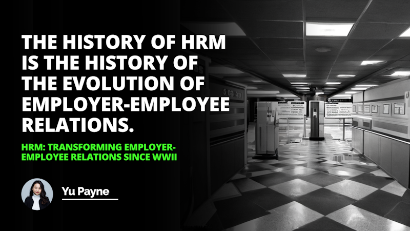 This is a black and white photograph of a hallway. The floor is checkered and has alternating white and black squares. There is a woman standing at the end of the hallway, wearing a white turtleneck and black jacket. On the left side of the image is a white letter “O” on a black background. There is also a green text on a black background at the bottom right of the image. The woman is standing in front of a black and white checkered floor. On the right side of the image is another white letter “O” on a black background, as well as another white letter on a black background. The image also features another white letter on a black background at the top right of the image. The hallway is long and narrow, and the checkered floor continues throughout the hallway.