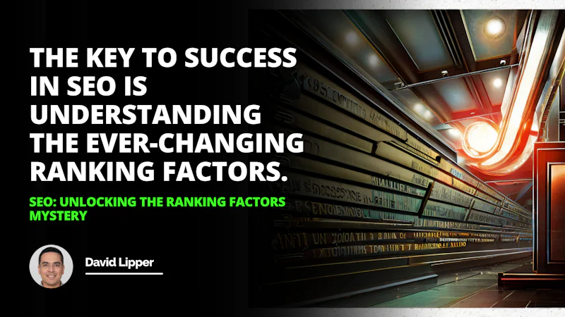 A man is seen standing in a long hallway with white walls and a red light illuminating the area. He is wearing glasses, and has a slight smile on his face. On the wall in the background is a black and white sign with white text, and beneath it are two white letters on a black background. The first is an 'O' and the second is an 'A'. The man stands in the middle of the hallway, his presence adding to the atmosphere.