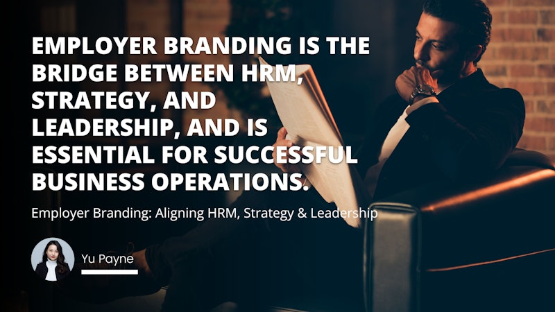 A man is sitting in a chair and reading a book. He is wearing a white turtleneck and black jacket. He has long hair. There is a newspaper in his hands. There is a close up of a chair in the background, as well as a black object and a white letter O on a black background. He is intently reading, focused on the material in front of him. The man is completely immersed in the text, and he appears to be enjoying it.