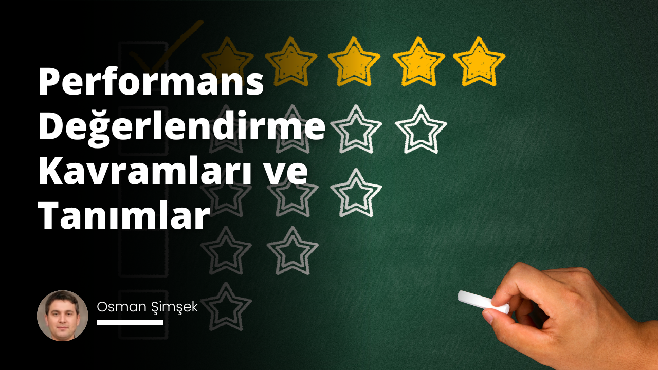 Görüntüde beyaz bir hap tutan bir elin yakın çekimi yer alıyor. El siyah bir eldiven giymiş ve bir kara tahta üzerine yazı yazıyor gibi görünüyor. Tahta koyu yeşil ve yazılar beyaz renkte. Elin kısa kahverengi saçları var ve hap da aynı beyaz renkte. Arka planda, yeşil bir yüzey üzerinde üç sarı yıldız var. İlk yıldız resmin sol üst köşesine yakın, ikinci yıldız resmin ortasına yakın ve üçüncü yıldız resmin sağ üst köşesine yakın. Yıldızların boyutları değişmekte ve yüzeyden hafifçe yükselmiş gibi görünmektedirler.