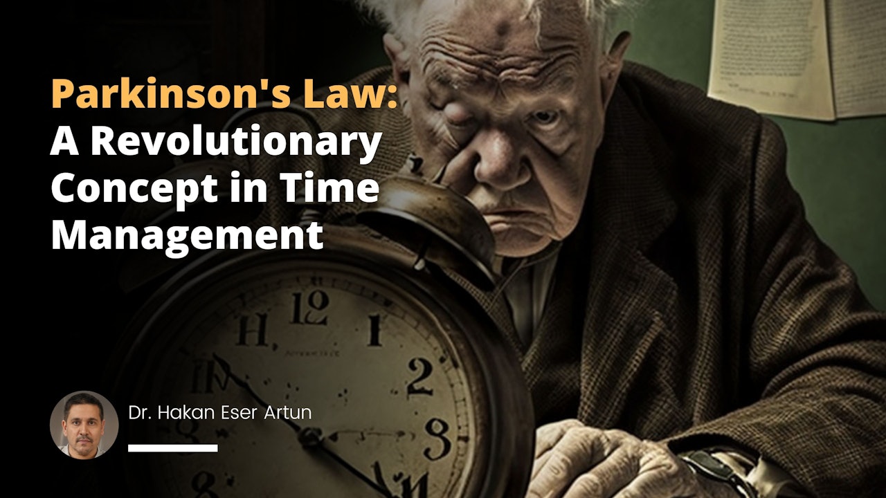 An elderly man with short hair and a mustache is sitting at a desk looking at an old alarm clock. The clock has a black face with white numbers, and he is focused intently on the time. He is wearing a blue shirt and sitting in a wooden chair. His hands are clasped together in front of him, and his expression is serious. He appears to be lost in thought, contemplating the time and its significance.