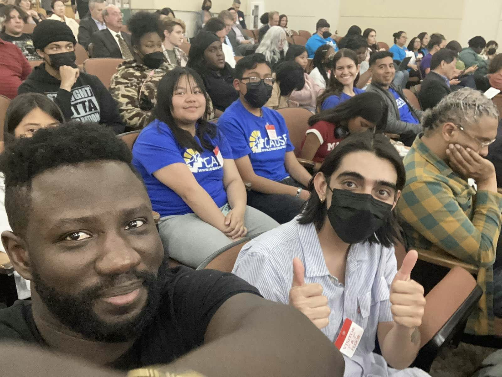 Selfie of organizers at a hearing in Sacramento.