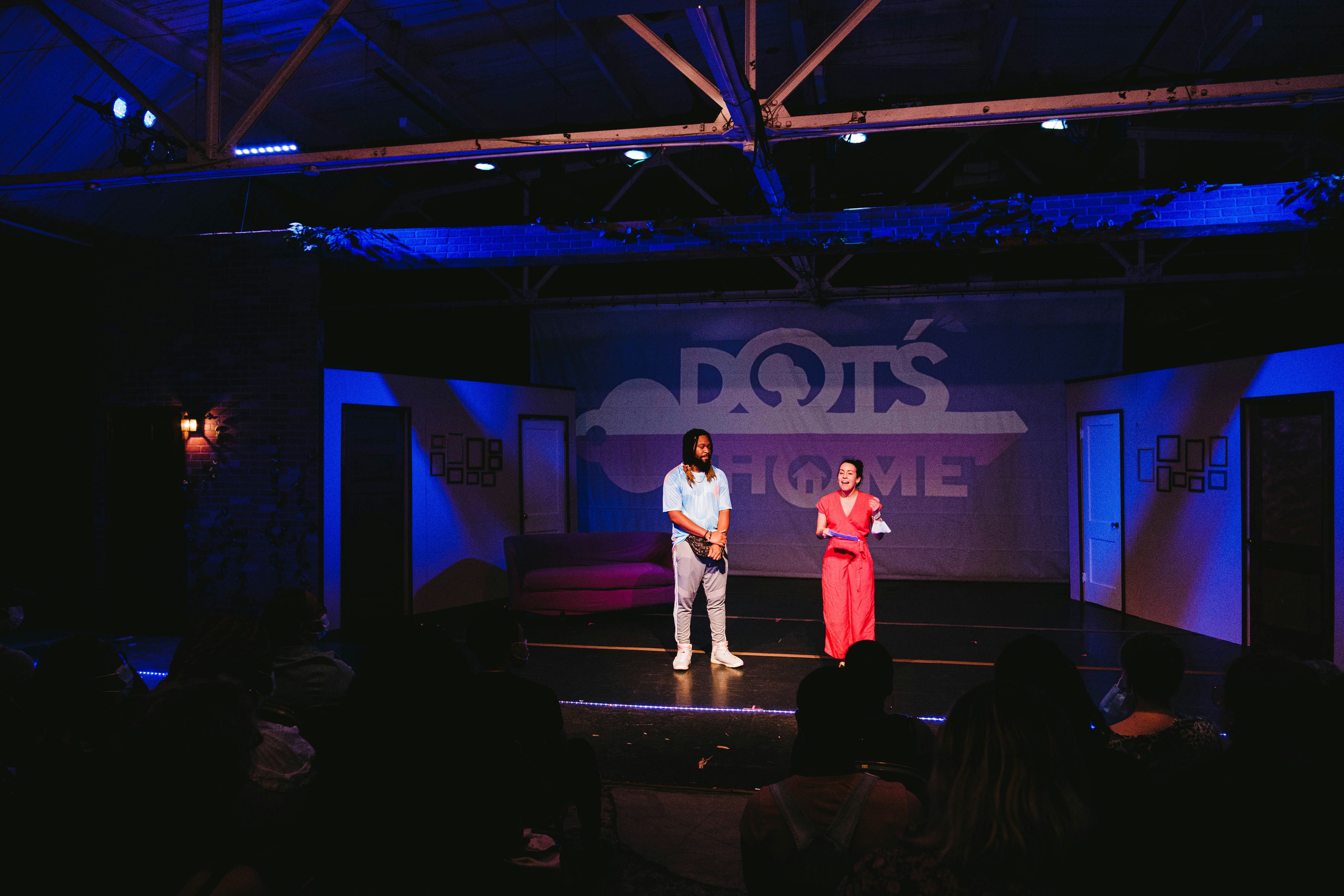 Anthony Baber and Christina Rosales on stage at the premier of Dot's Home Live in Detroit