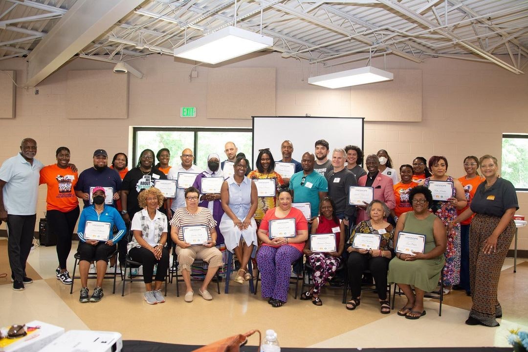 Board members of the Atlanta Neighborhood Planning Unit’s NPU University taking a group photo after GA STAND-UP's “Use Your Toolbox” training.