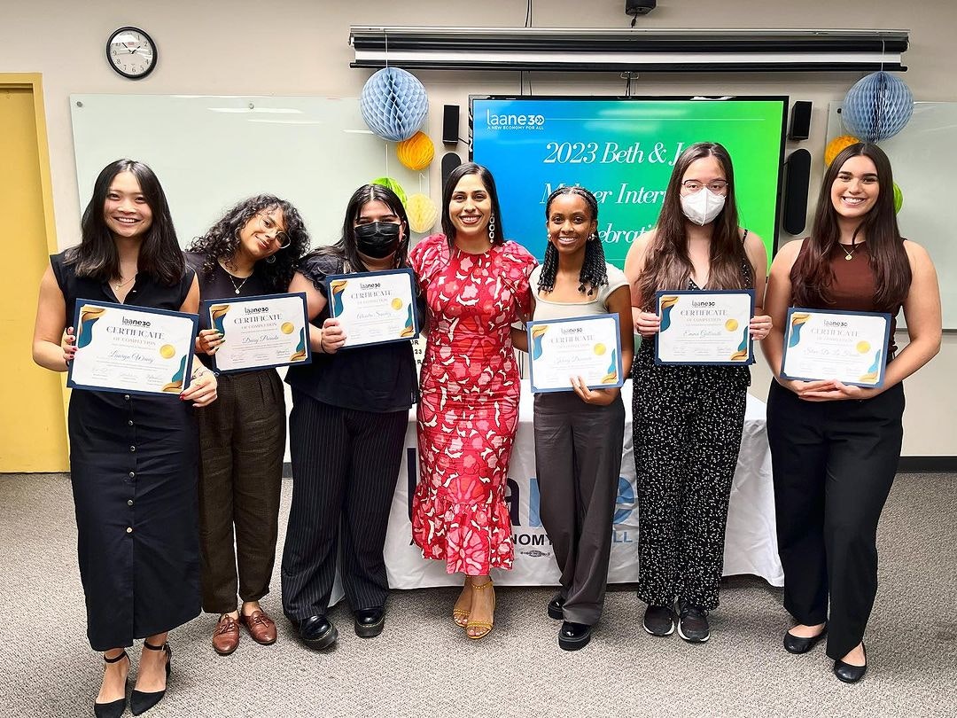 LAANE's 2023 Beth and Julia Meltzer Summer Interns smiling and holding certificates