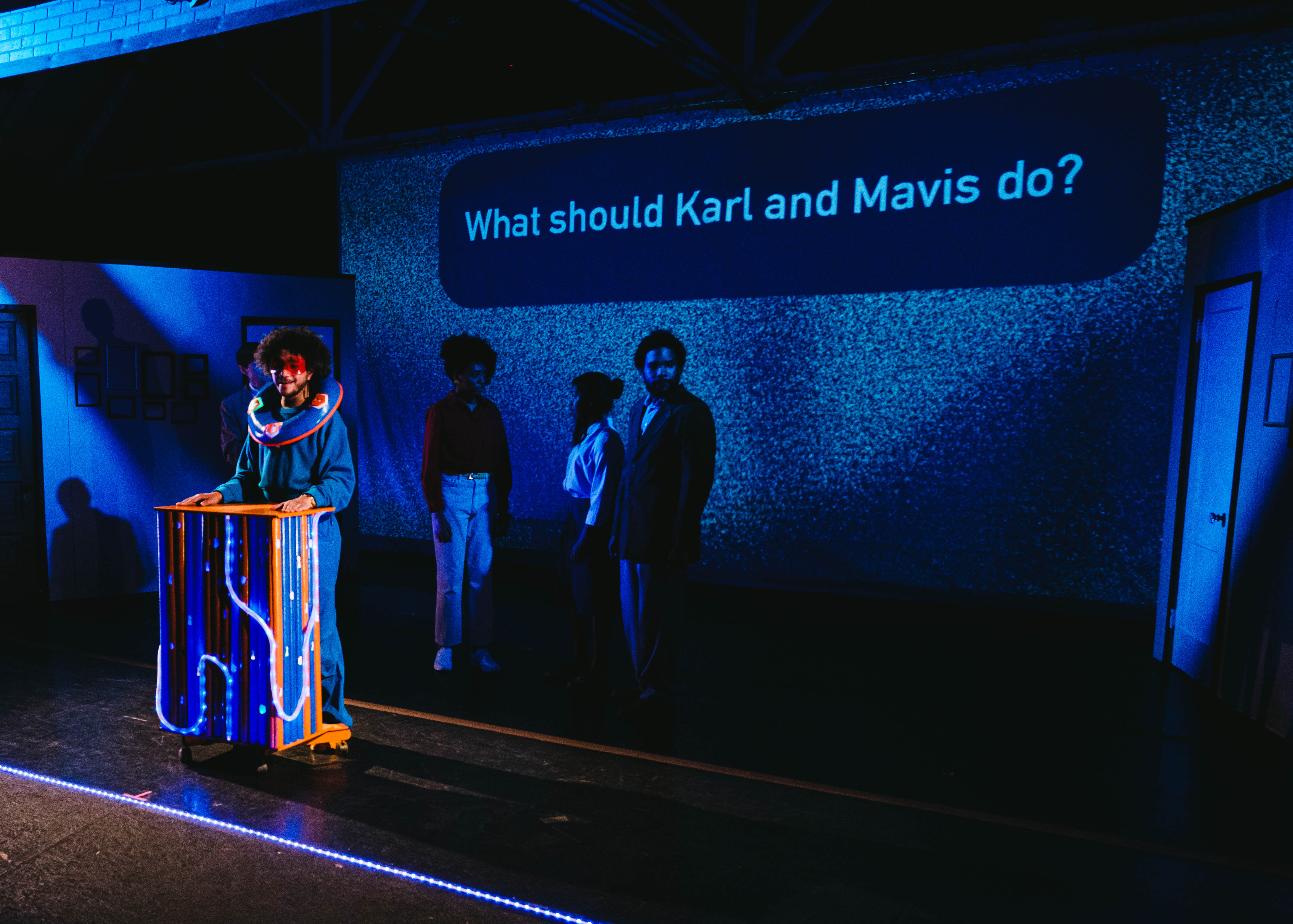 Characters on stage in Dot's Home Live