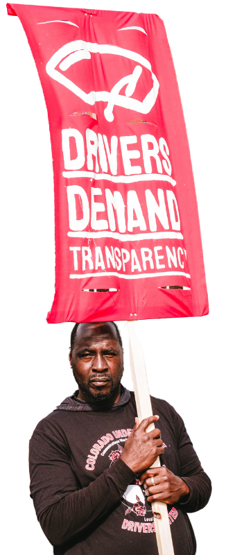 Uber driver with Colorado Independent Drivers United carrying a sign that reads "Drivers demand transparency"