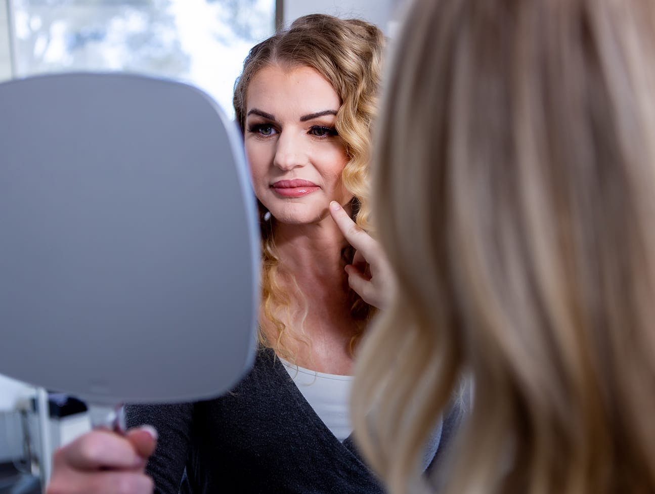 patient looking in mirror
