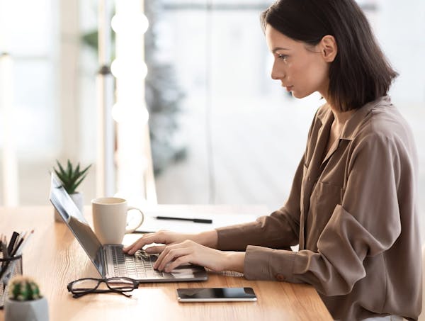 woman working on laptop