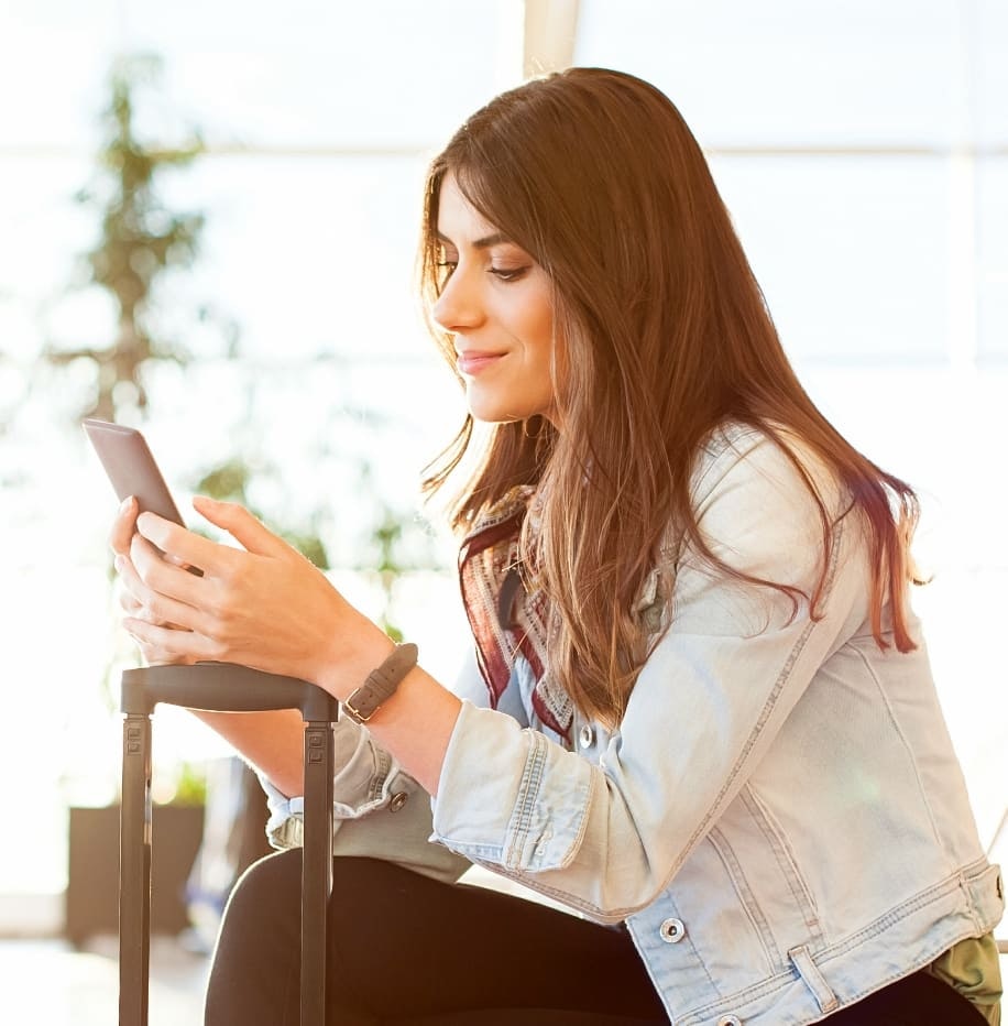 attractive woman looking at her phone
