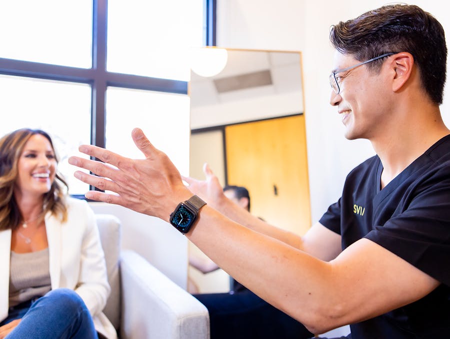 Dr. Liu with a patient