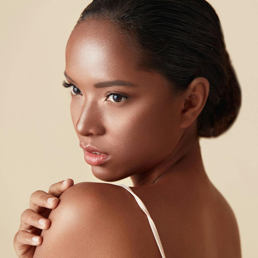Woman looking over her shoulder