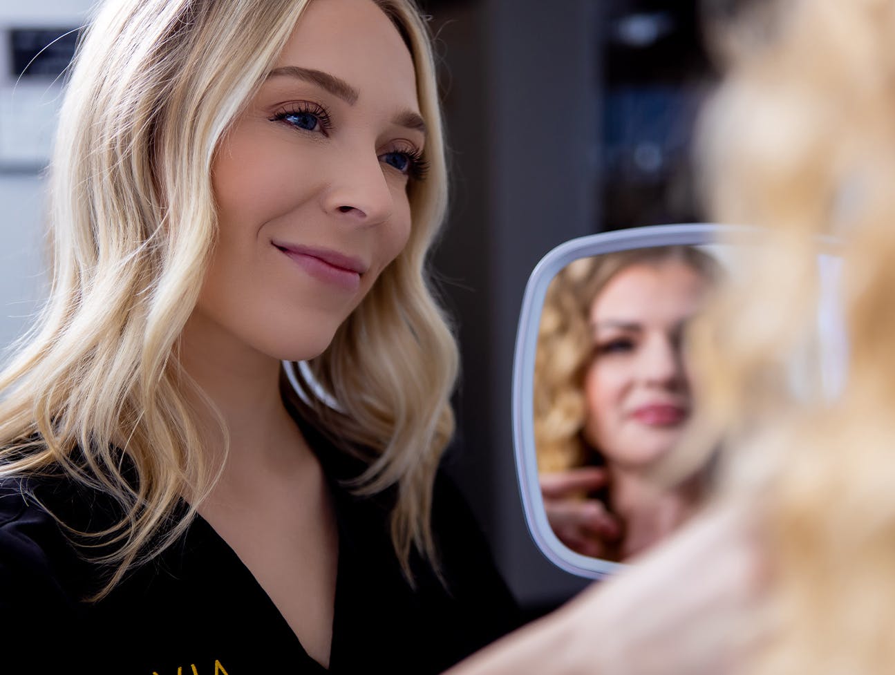 staff giving patient a mirror