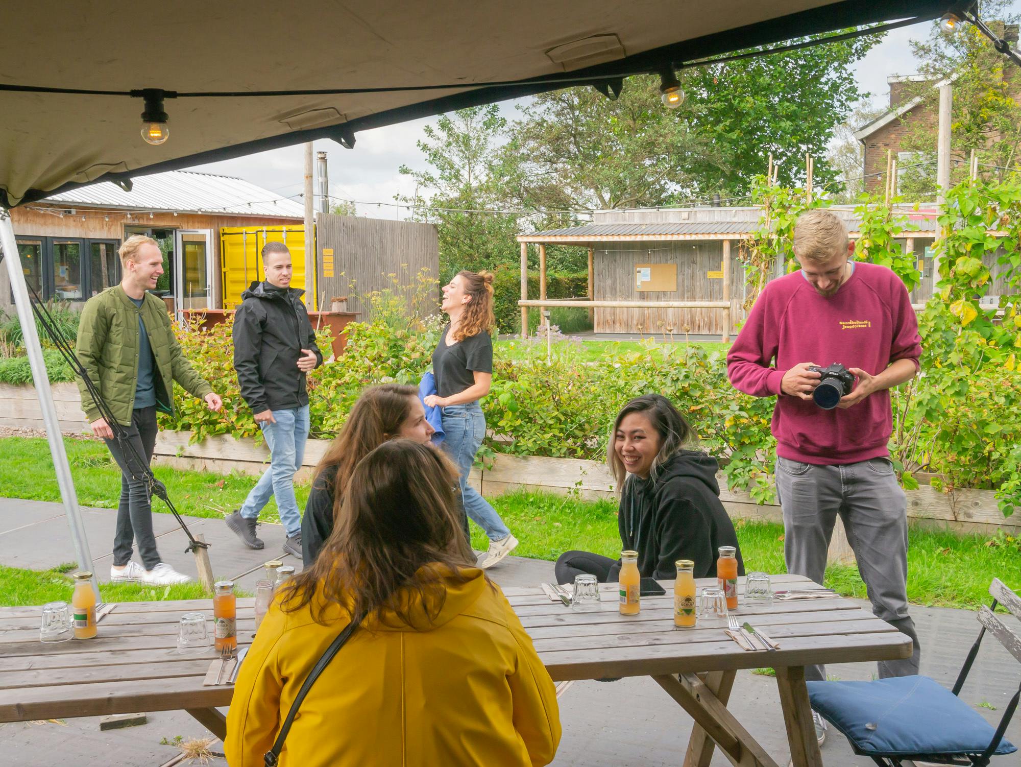 People sitting at a picknick table