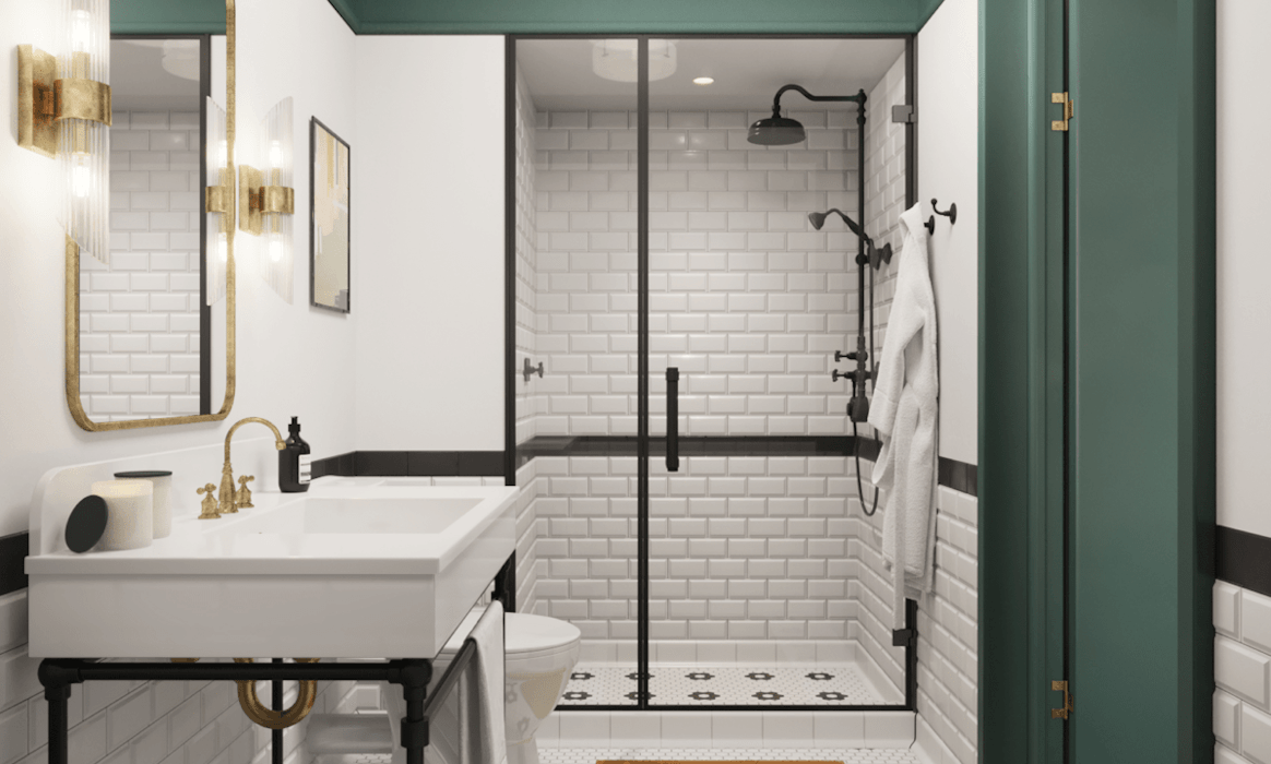 Bathroom interior with white tiles, black accents, and green painted trim.