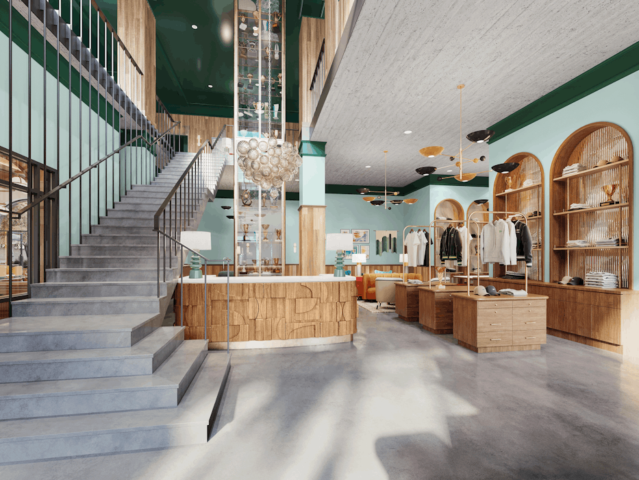 Eugene interior with merchandise displays and a large staircase leading to another level.