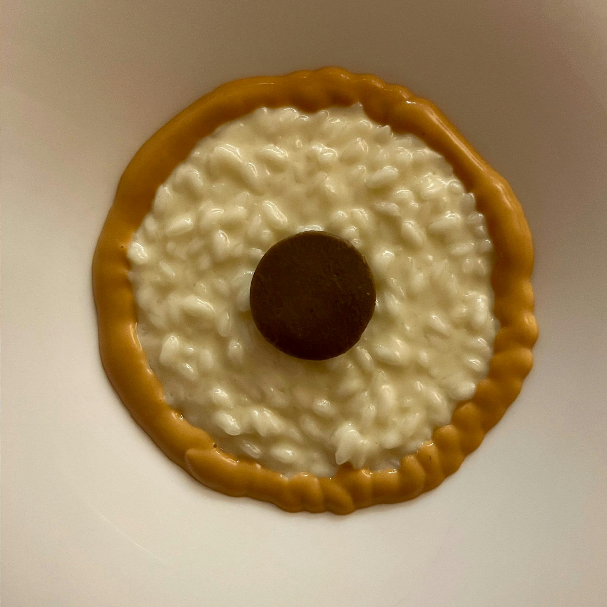 Lux Lucis: Risotto tom yum, ricci di mare e tartufo nero