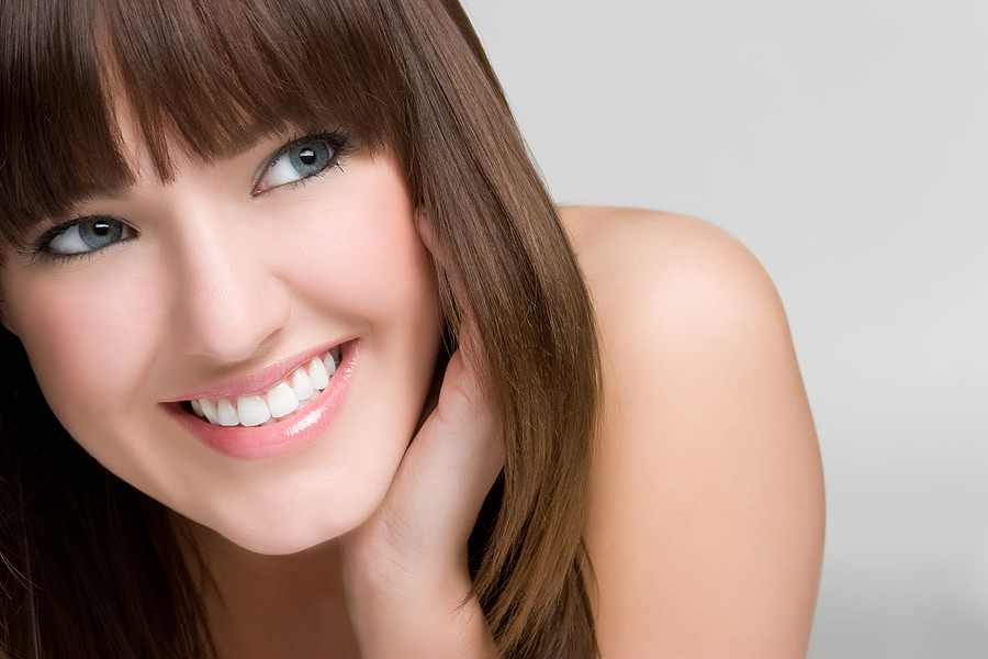 bigstock_beautiful_smiling_woman_12036431