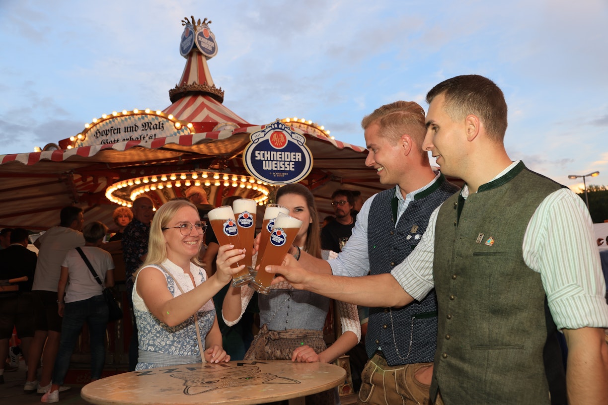 People drinking Schneider Weisse beer
