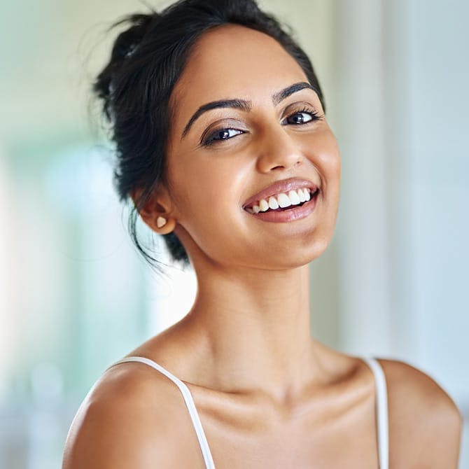 Woman of middle-eastern heritiage smiling