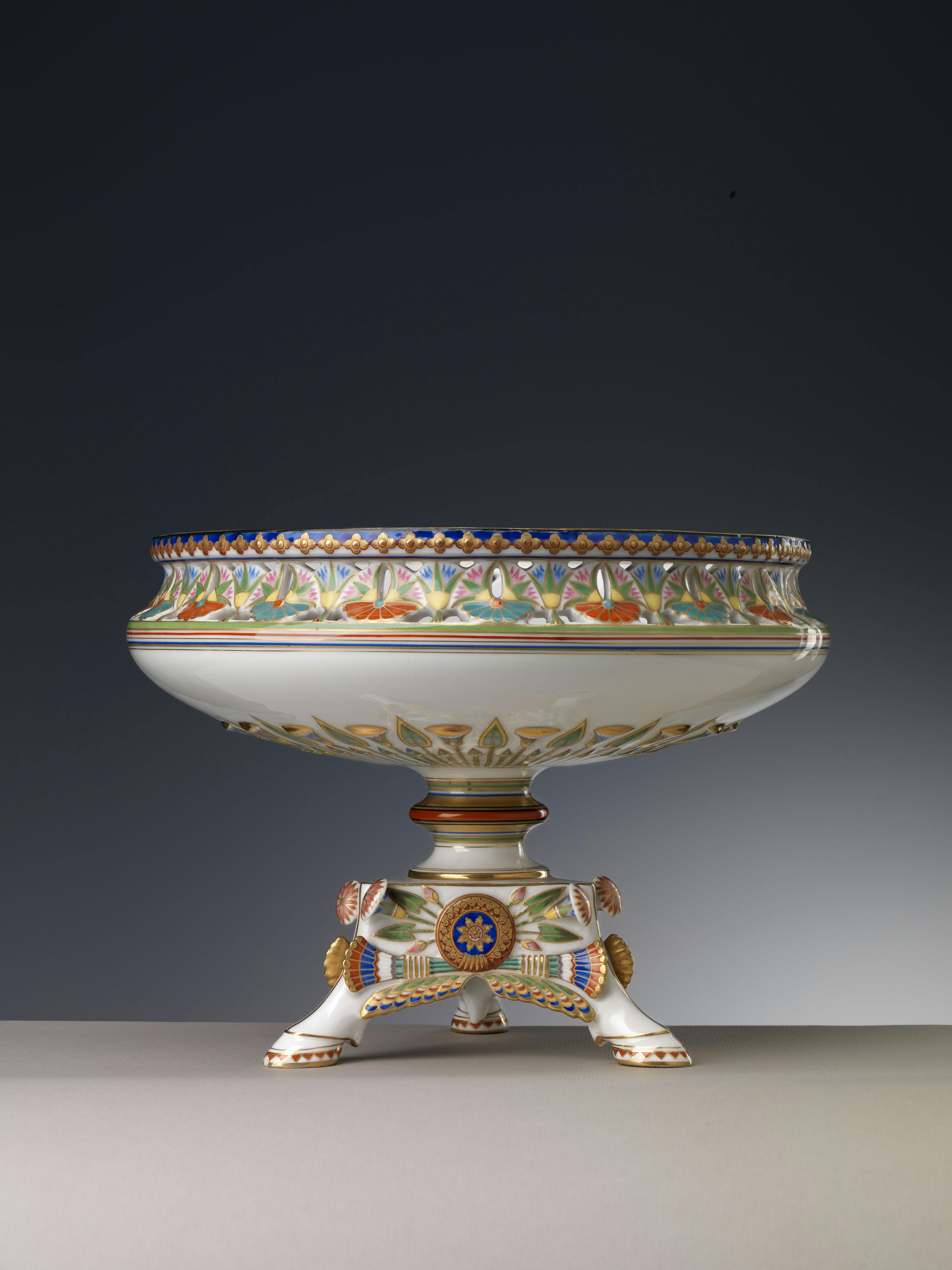 White tazza with zoomorphic feet and polychrome decorations featuring Oriental-inspired motifs