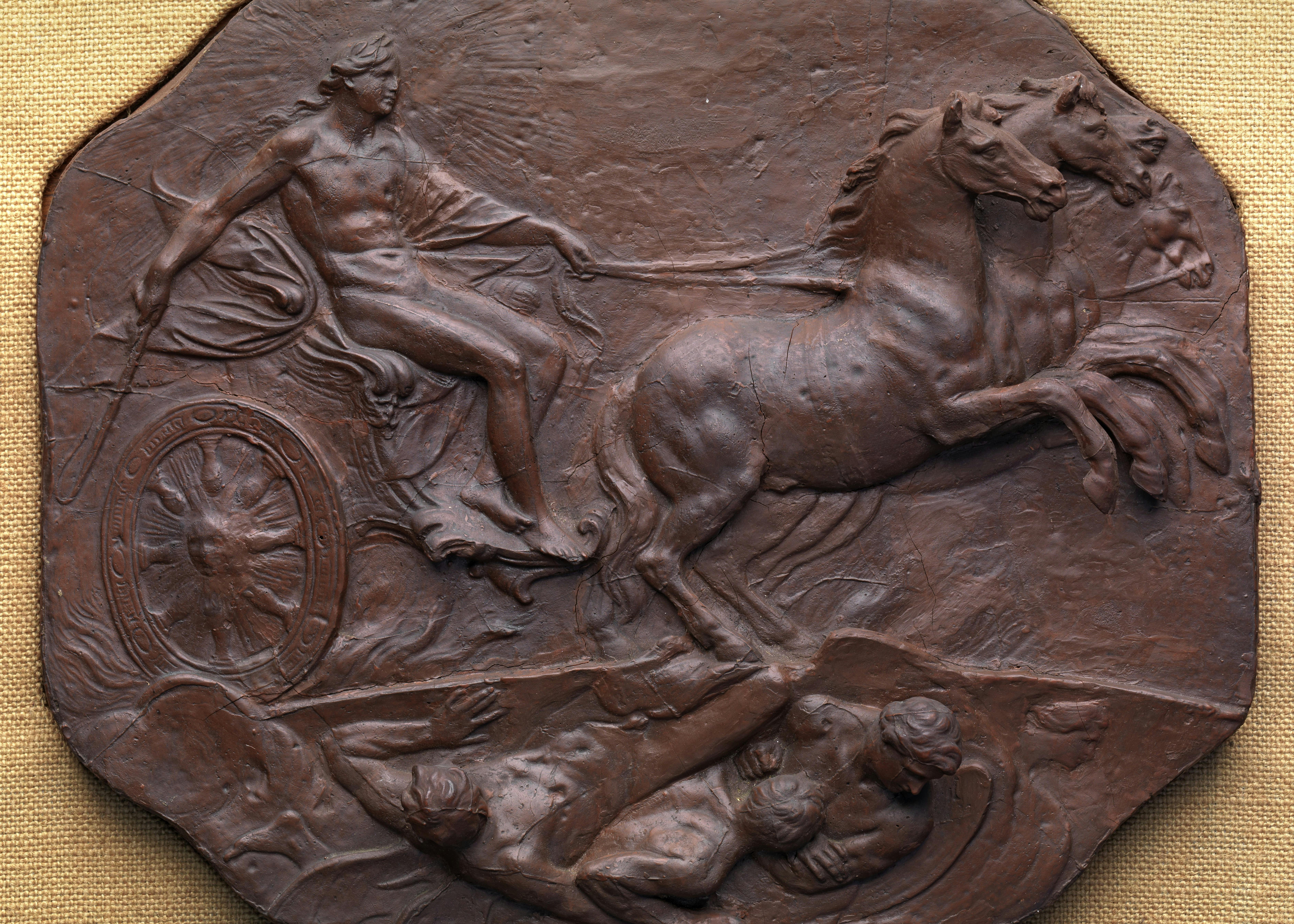 L'opera raffigura una figura maschile che conduce un carro trainato da due cavalli