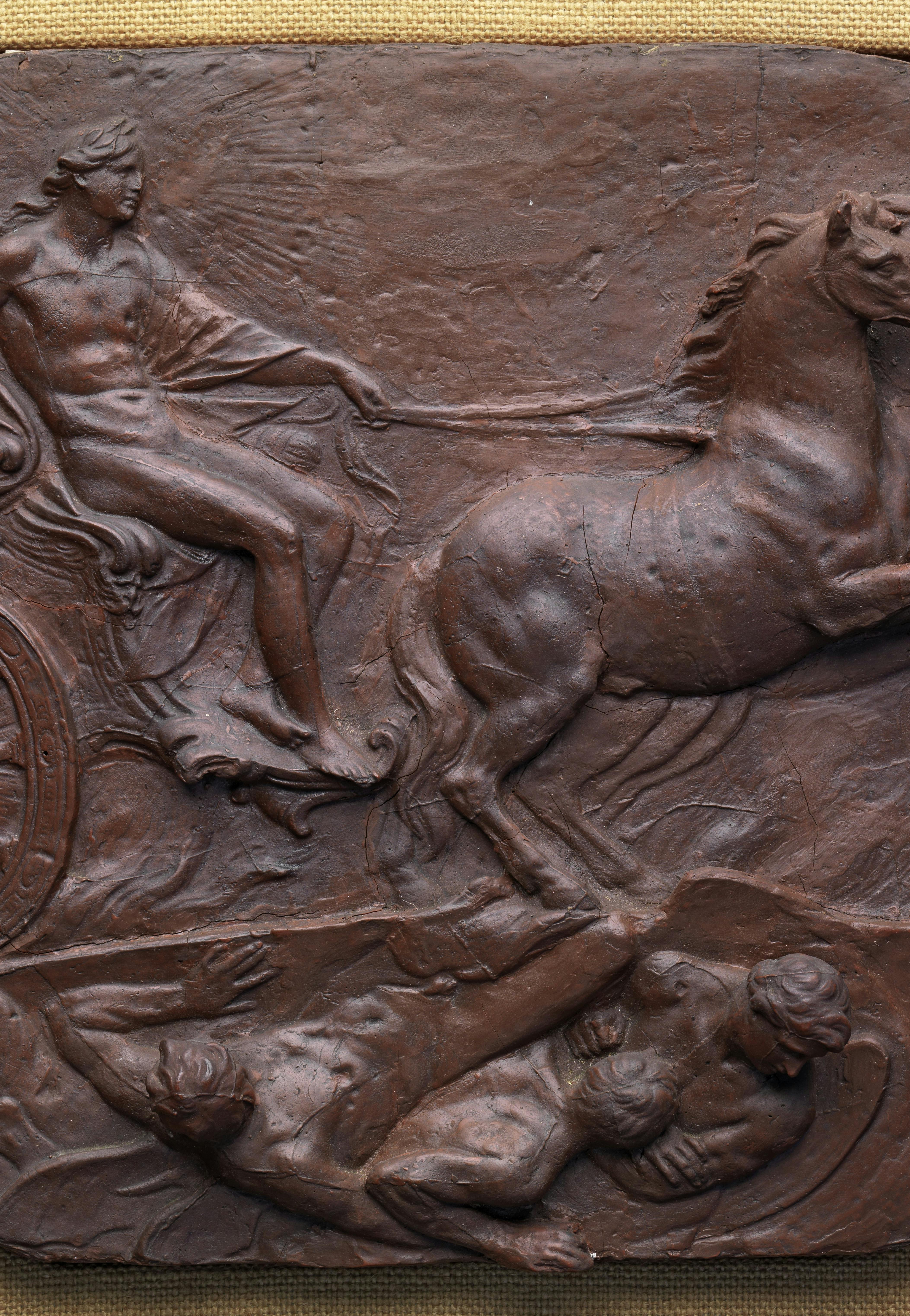 L'opera raffigura una figura maschile che conduce un carro trainato da due cavalli