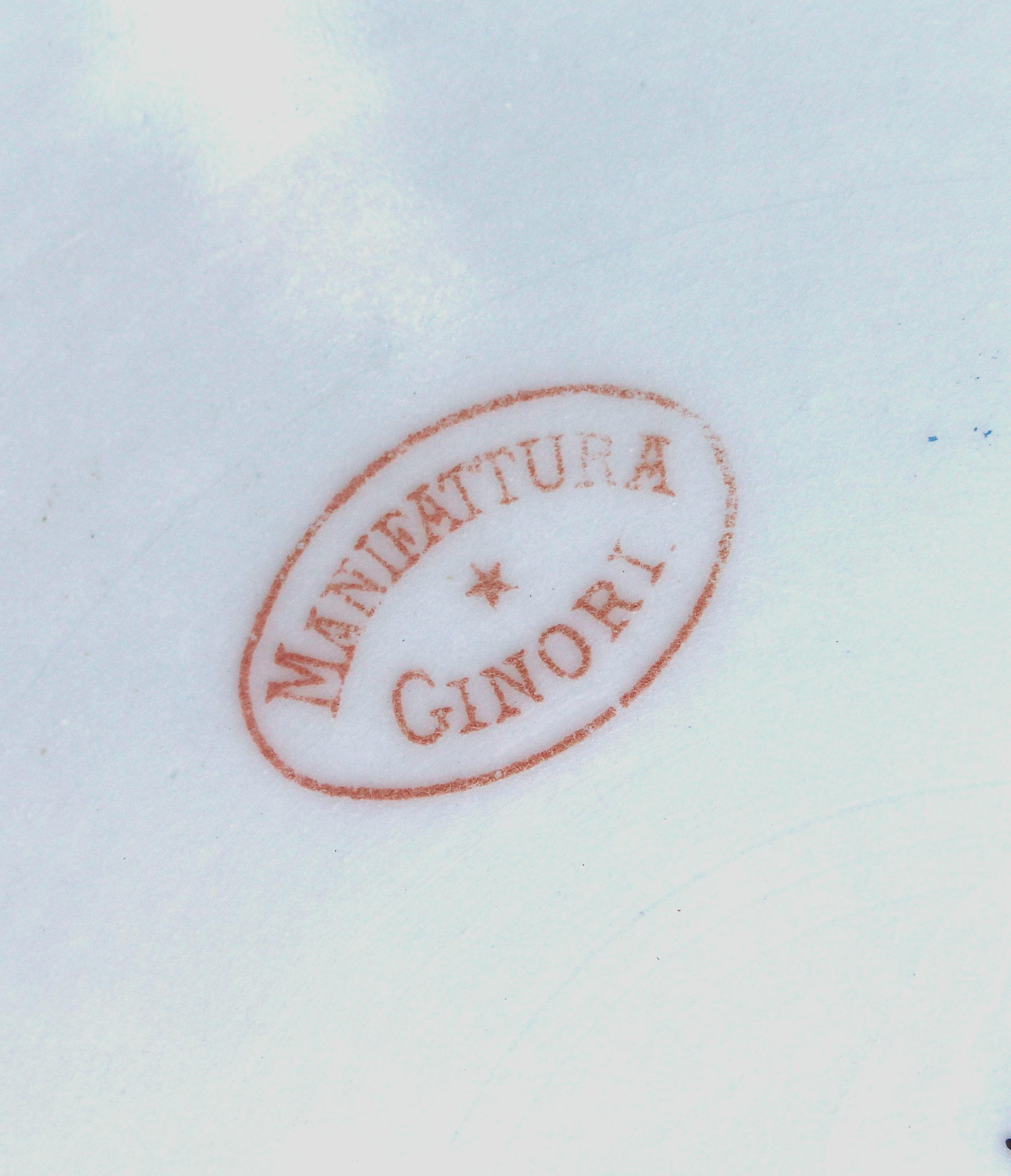 Ovale rosso con scritta Manifattura Ginori in stampatello