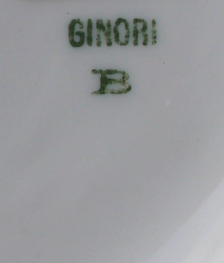 Green inscription 'GINORI' with the letter B below.