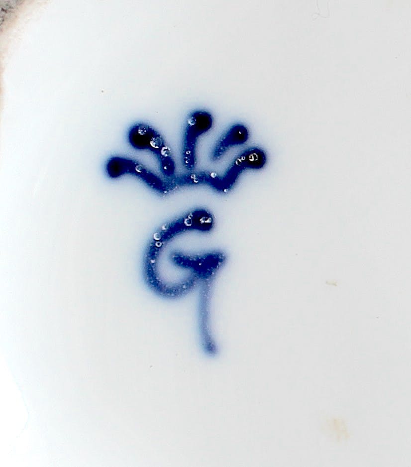 G maiusola dipinta a mano in blu
