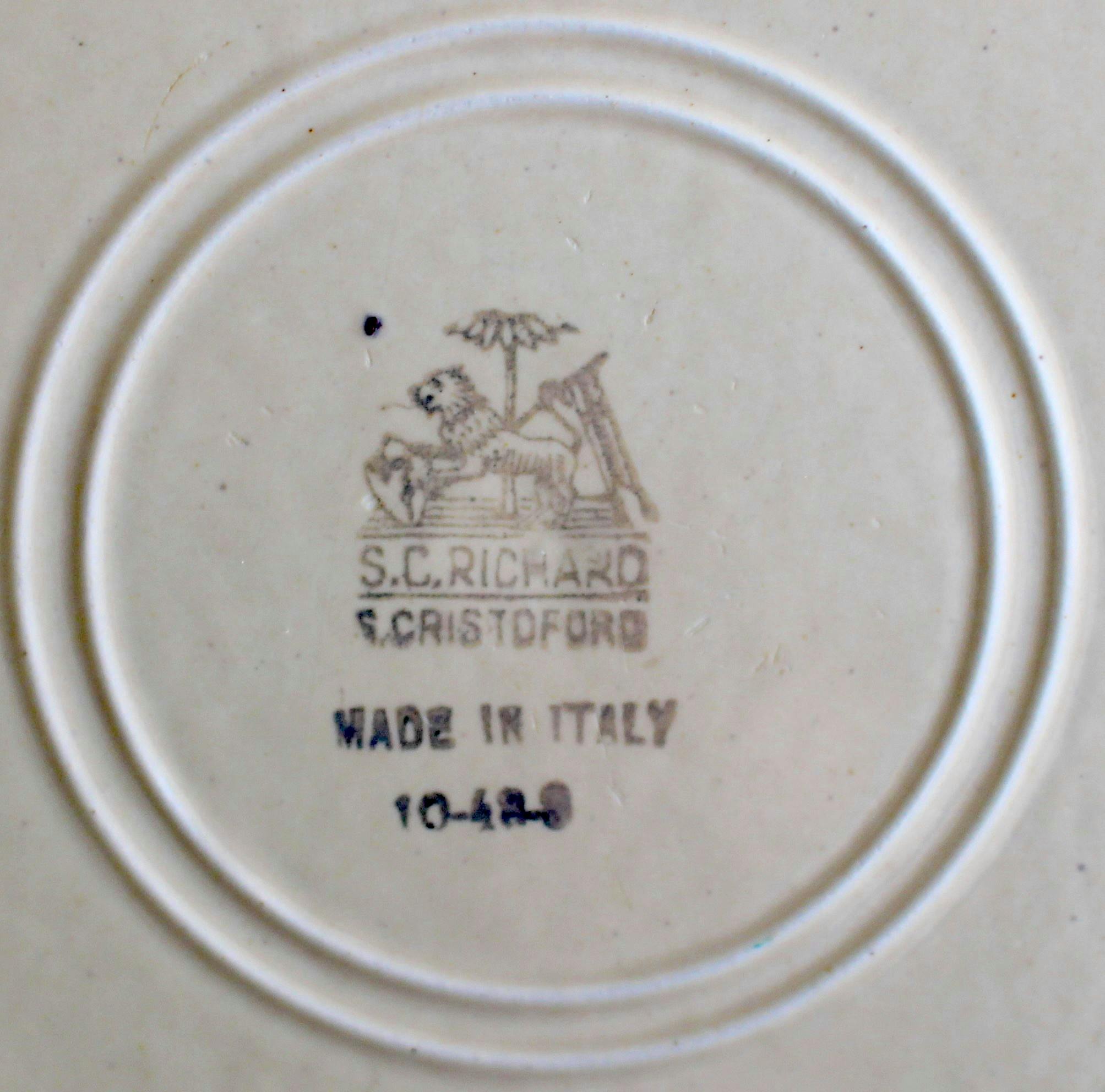 Stamp with lion and inscriptions.