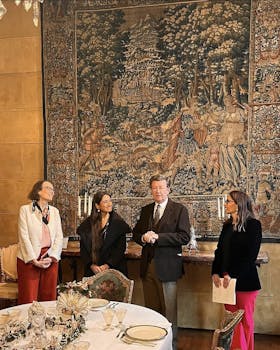 Four people presenting the exhibition