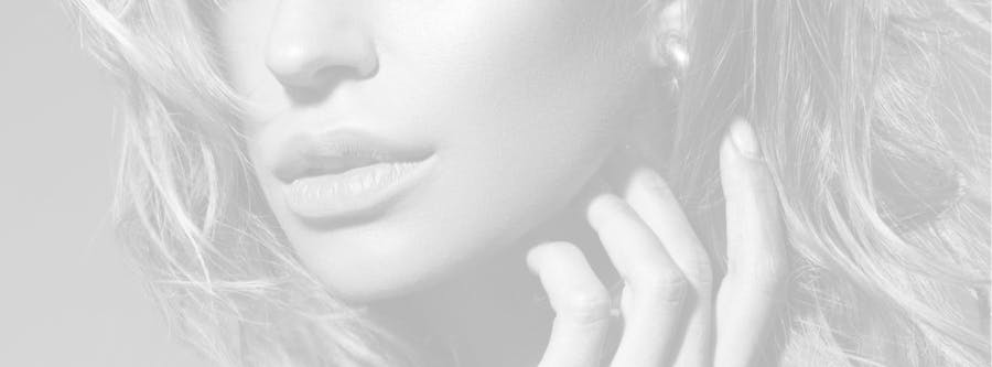 Woman with amazingly smooth skin showing the possible benefits of Xeomin