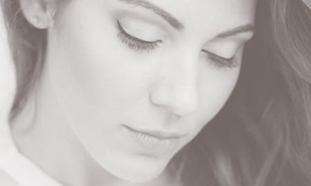 Beautiful woman looking down.