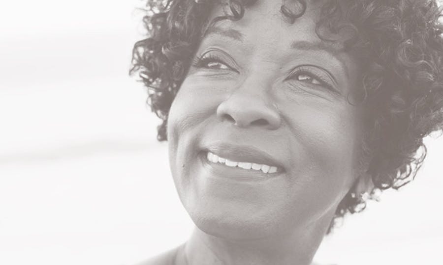 A woman with curly hair.
